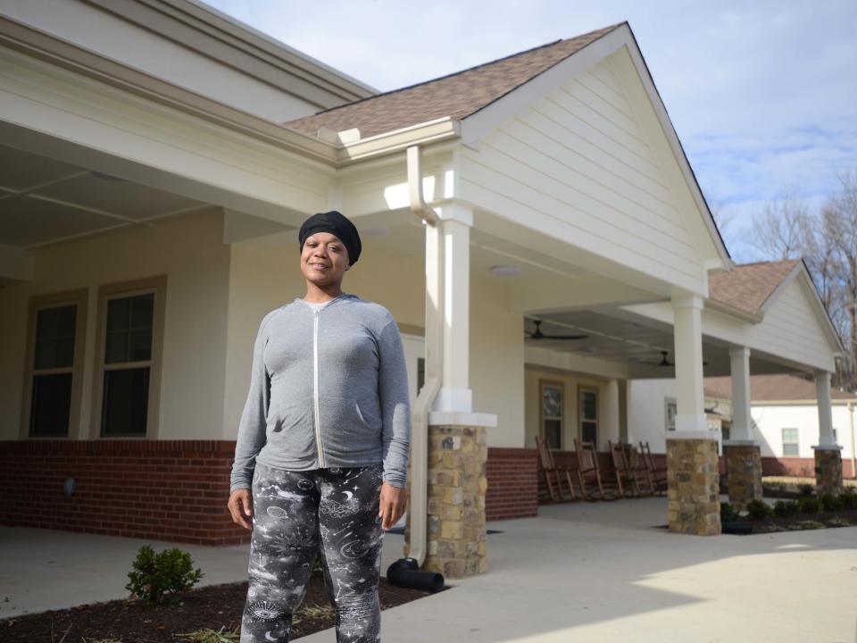 Krystle Terry stands outside The Dream Center in Jackson, Tenn., on Thursday, Dec. 21, 2023. Terry, alongside her two children, left her home following a domestic violence-charged relationship.