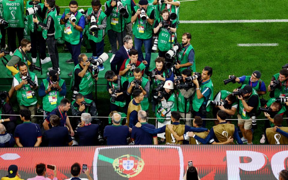 General view of photographers as Portugal's Cristiano Ronaldo lines up - REUTERS