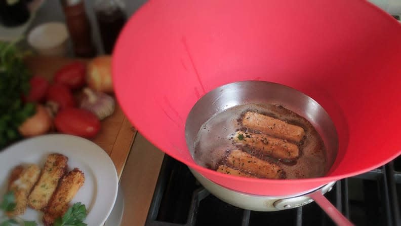 Keep your cooking tidy and precise with this frying wall.