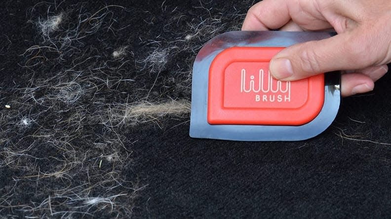 This little brush is ideal for getting hair out of your car.