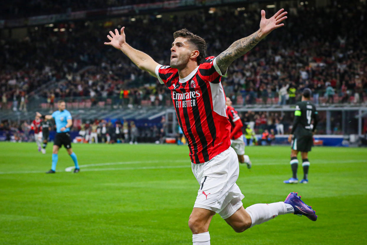 MILAN, ITALY - SEPTEMBER 17: Christian Pulisic of AC Milan celebrates the goal scored during the UEFA Champions League 2024/25 League Phase MD1 match between AC Milan and Liverpool FC at Stadio San Siro on September 17, 2024 in Milan, Italy. (Photo by Vasile Mihai-Antonio/Getty Images)