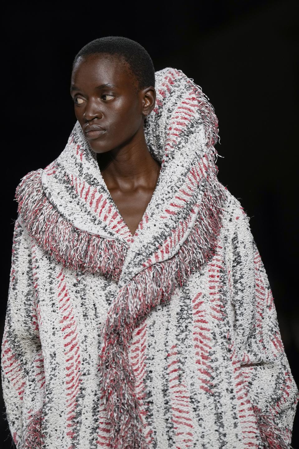 A model wears a creation as part of the Bottega Veneta women's Spring Summer 2024 collection presented in Milan, Italy, Saturday, Sept. 23, 2023. (AP Photo/Antonio Calanni)