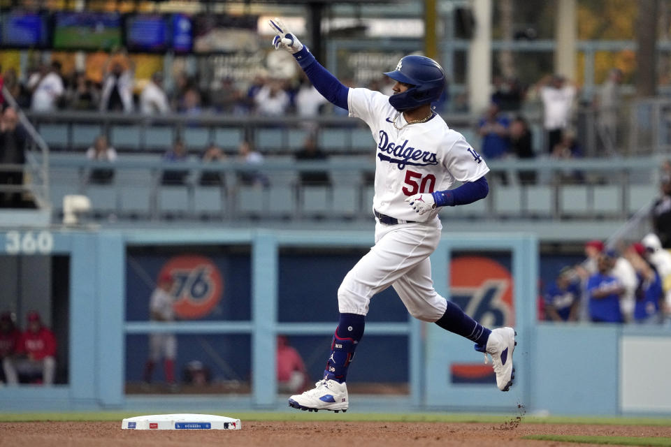 Los Angeles Dodgers' Mookie Betts rounds second after hitting a solo home run during the third inning of a baseball game against the Los Angeles Angels Friday, July 7, 2023, in Los Angeles. (AP Photo/Mark J. Terrill)