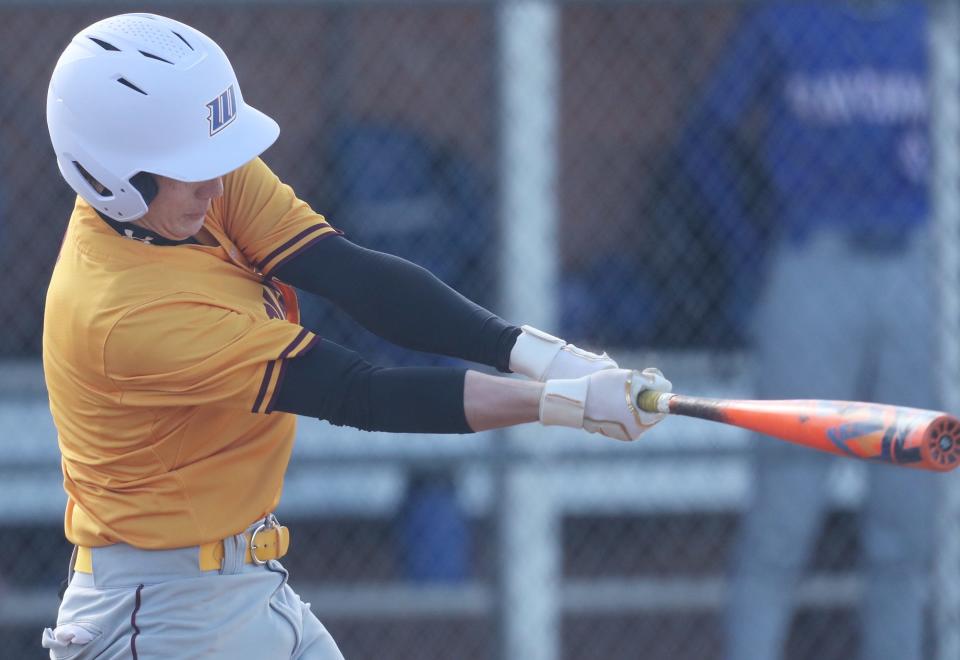 Southeast Bradee Blankenship hits a RBI single during their game against Ravenna at Southeast High School on Thursday, April 25, 2024 in Palmyra Township.