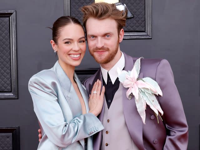 <p>Frazer Harrison/Getty</p> Claudia Sulewski and FINNEAS attend the 64th Annual GRAMMY Awards on April 03, 2022 in Las Vegas, Nevada.