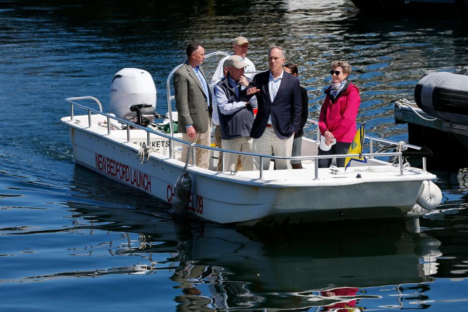 U.S. Department of Transportation Maritime Administration (MARAD) Rear Admiral Ann C. Phillips, right, New Bedford Mayor Jon Mitchell, center, and New Bedford Port Authority Executive Director Gordon Carr tour New Bedford harbor.
