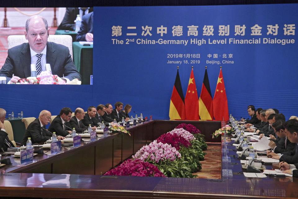 German Finance Minister Olaf Scholz, fourth from left, speaks during the China-Germany High Level Financial Dialogue with Chinese Vice Premier Liu He at the Diaoyutai State Guesthouse in Beijing, Friday, Jan. 18, 2019. (AP Photo/Andy Wong, Pool)