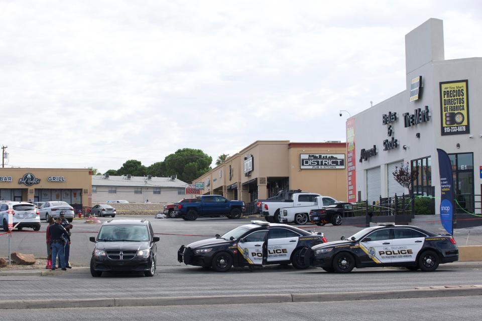 El Paso police investigate the scene of a shooting that killed two people and wounded four others on Thursday at Airway Plaza, 1160 Airway Blvd., an area of bars and restaurants in East-Central El Paso.