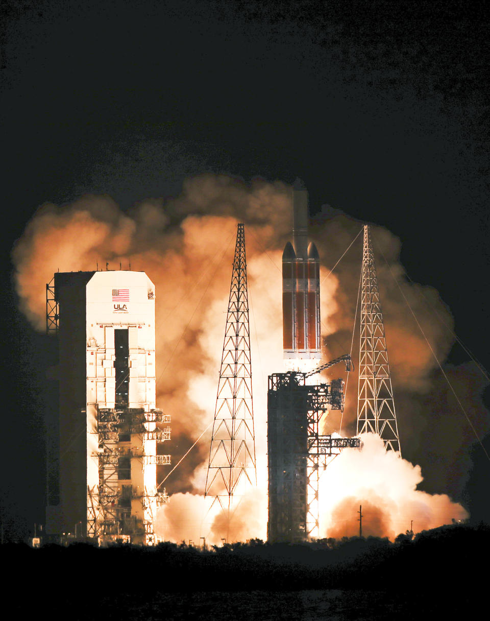 A Delta IV rocket, carrying the Parker Solar Probe, lifts off from launch complex 37 at the Kennedy Space Center, Sunday, Aug. 12, 2018, in Cape Canaveral, Fla. The Parker Solar Probe will venture closer to the Sun than any other spacecraft and is protected by a first-of-its-kind heat shield and other innovative technologies that will provide unprecedented information about the Sun. (AP Photo/John Raoux)