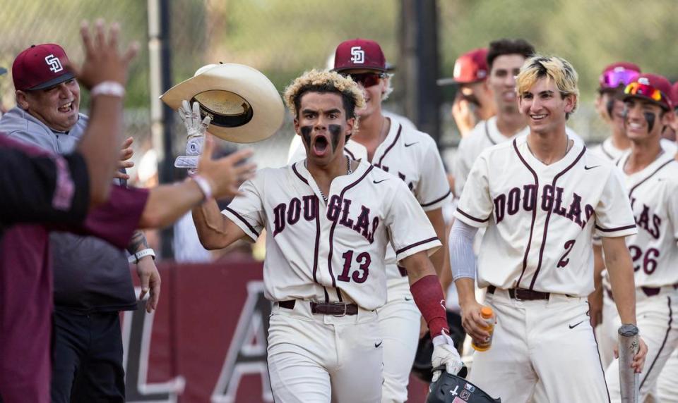 Marjory Stoneman Douglas’ Alex Rodriguez (13) reacts after hitting a home run against Christopher Columbus in the second inning of their Region 4-7A baseball game final at Anthony Rizzo Field on Tuesday, May 16, 2023, in Parkland, Fla.