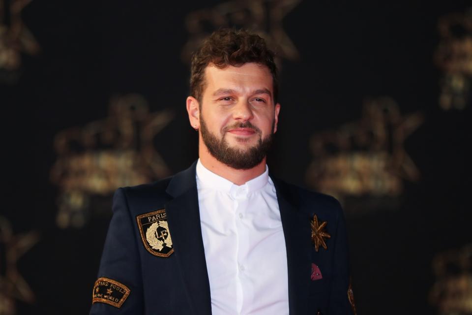 French singer and accordionist Claudio Ruccolo aka Claudio Capeo poses on the red carpet upon his arrival to attend the 20th NRJ Music Awards ceremony at the Palais des Festivals, in Cannes, southeastern France, on November 10, 2018. (Photo by Valery HACHE / AFP)        (Photo credit should read VALERY HACHE/AFP via Getty Images)