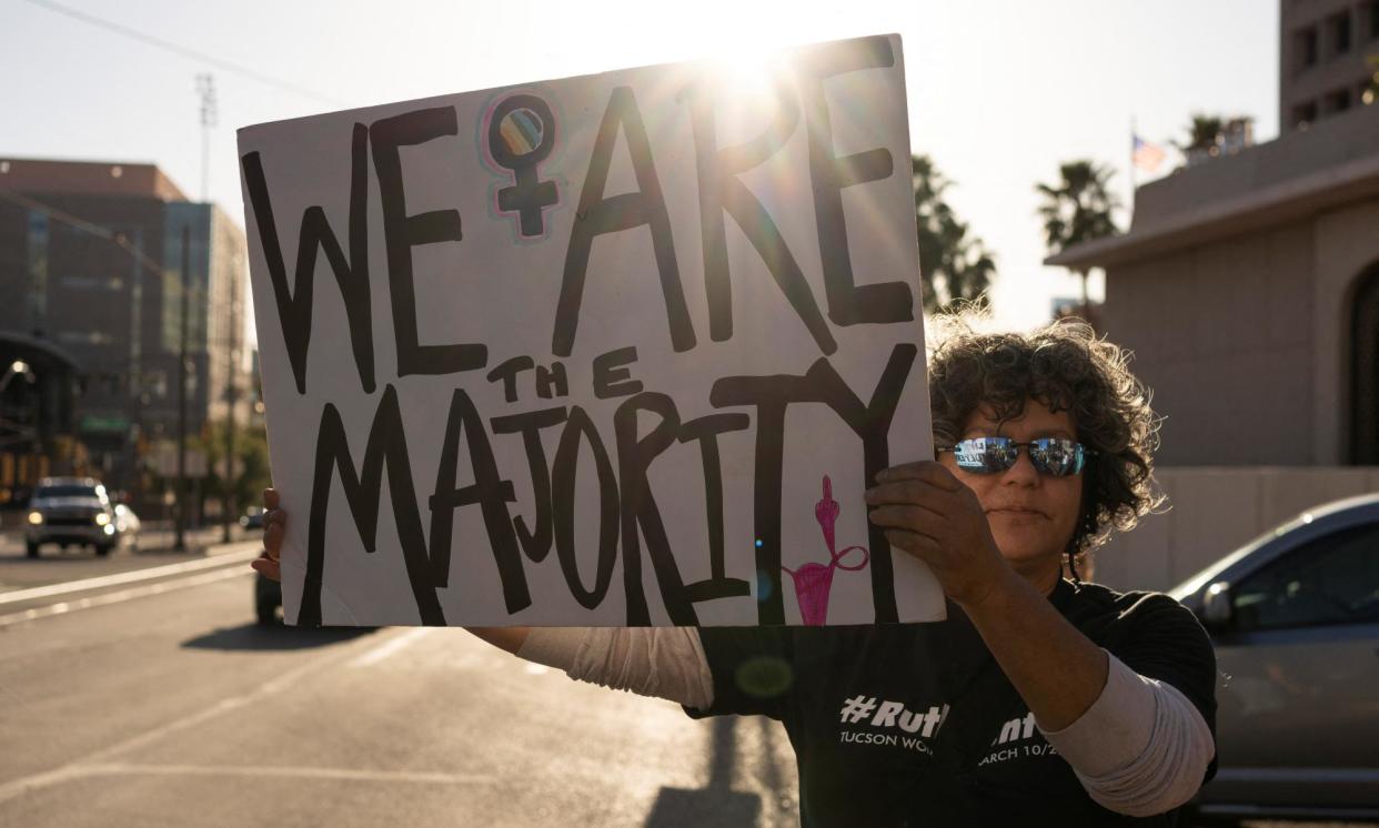 <span>A protester in Tucson, Arizona, on Tuesday.</span><span>Photograph: Rebecca Noble/Reuters</span>