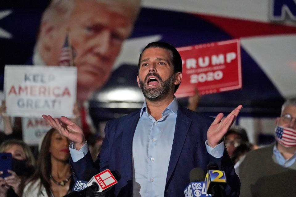 Donald Trump Jr., gestures during a news conference at Georgia Republican Party headquarters Thursday, Nov. 5, 2020 in Atlanta.