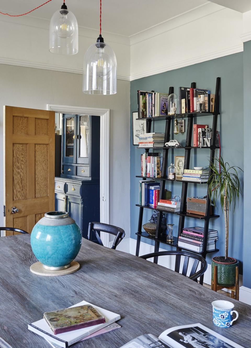 dining room painted in farrow ball with bookshelf