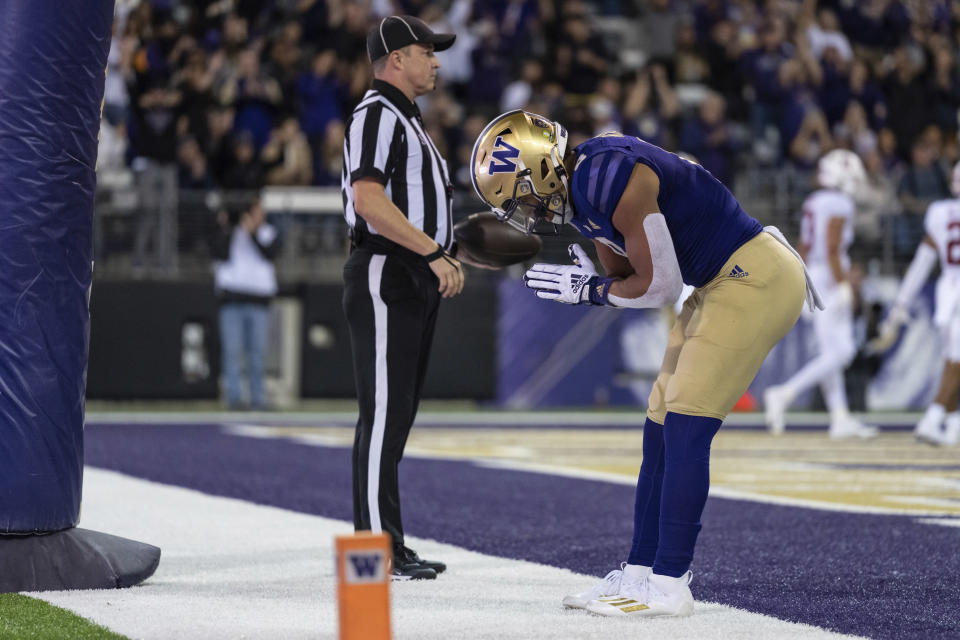 Washington running back Will Nixon reacts after scoring a touchdown during the first half of the team's NCAA college football game against Stanford, Saturday, Sept. 24, 2022, in Seattle. (AP Photo/Stephen Brashear)