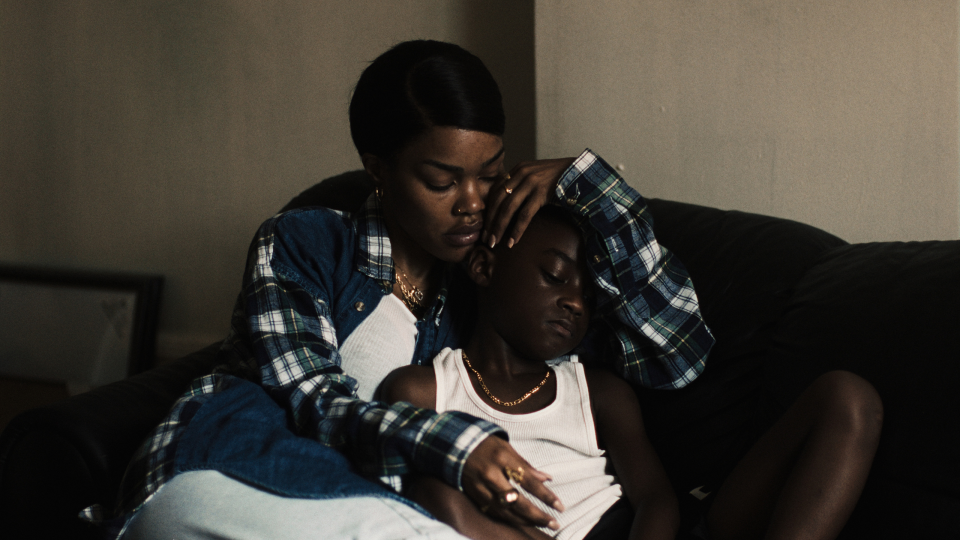 Teyana Taylor stars as a Harlem woman taking care of her son (Aaron Kingsley Adetola) as their lives and surroundings change over time in the drama "A Thousand and One."