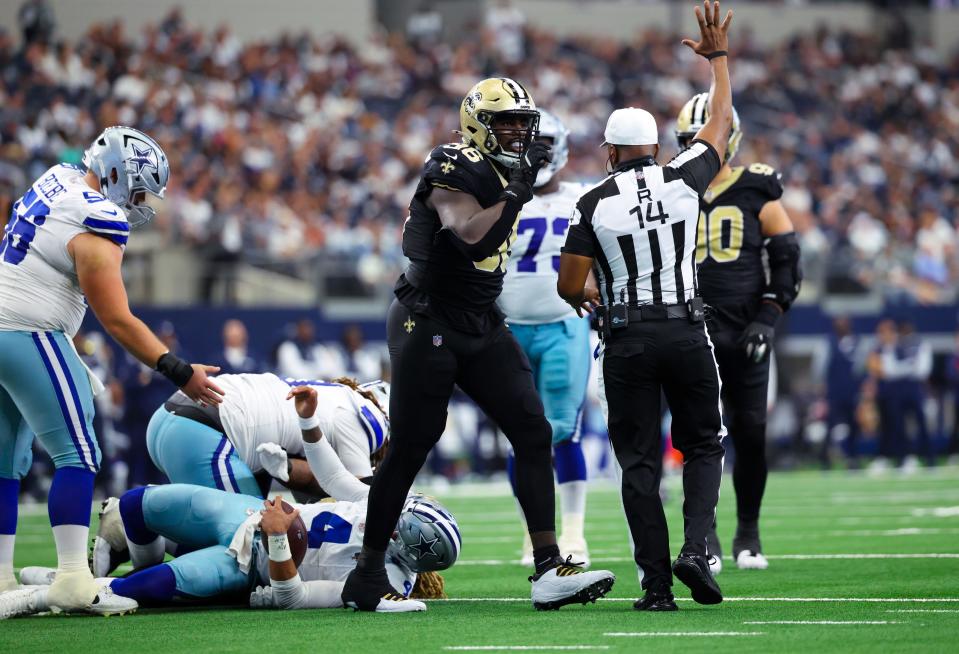 Sep 15, 2024; Arlington, Texas, USA; New Orleans Saints defensive end Carl Granderson (96) reacts after a sack on Dallas Cowboys quarterback Dak Prescott (4) during the second half at AT&T Stadium. Mandatory Credit: Kevin Jairaj-Imagn Images