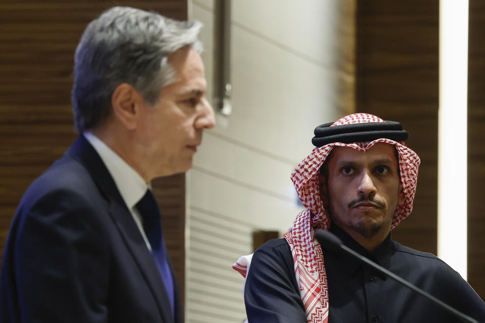 U.S. Secretary of State Antony Blinken, left, and Qatar's Prime Minister and Foreign Minister Sheikh Mohammed bin Abdulrahman Al Thani attend a press conference, during Blinken's week-long trip aimed at calming tensions across the Middle East, in Doha, Qatar, Sunday, Jan. 7, 2024. (Evelyn Hockstein/Pool via AP)