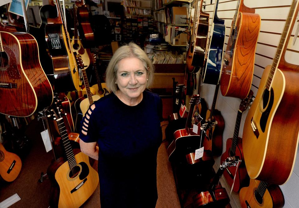 Eileen Sordyl, daughter of the owners of House of Music in Springfield Ralph and Jane Sordyl, at the music store Friday June 3, 2022. [Thomas J. Turney/ The State Journal-Register]