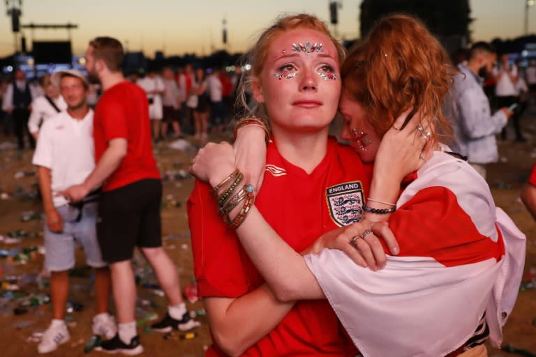 Supporters in London react after England lost their World Cup semi-final to Croatia