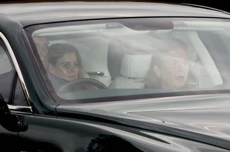 Sarah Ferguson and Prince Andrew, and their daughter Princess Beatrice, arrive at Windsor Castle a day ahead of their daughter Princess Eugenie's wedding to Jack Brooksbank in Windsor, Britain, October 11, 2018. REUTERS/Darren Staples