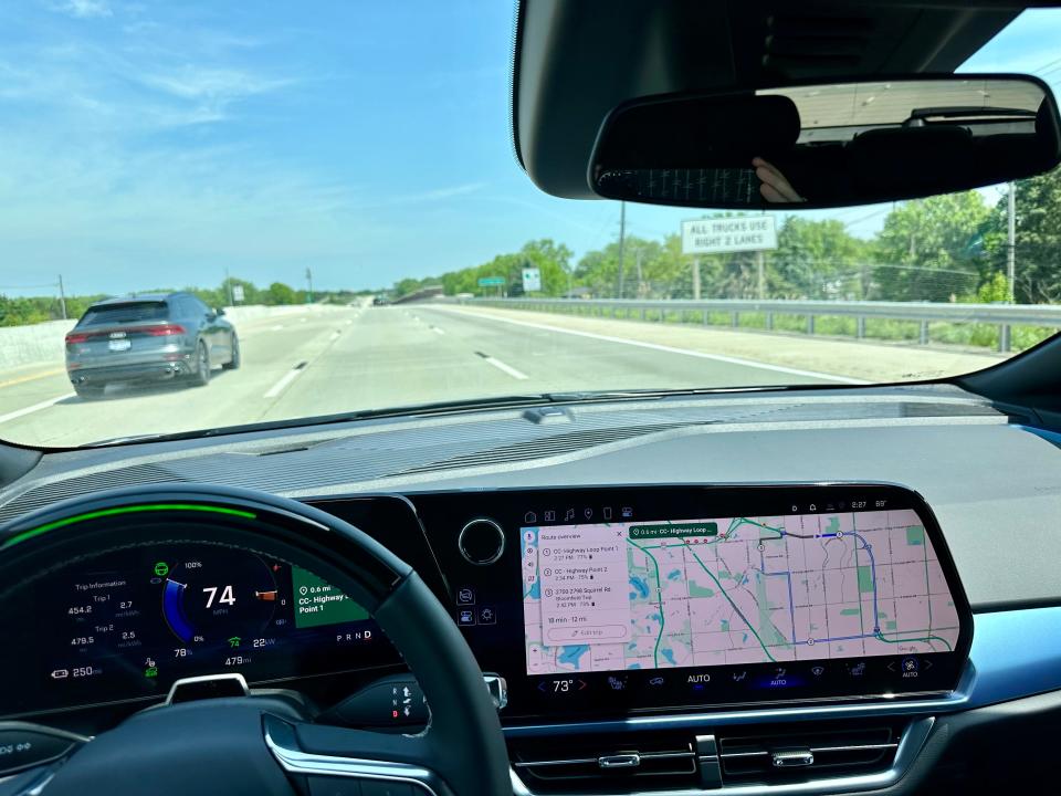 The view from behind the wheel of the Chevrolet Equinox EV while it drives using the hands-free Super Cruise technology.