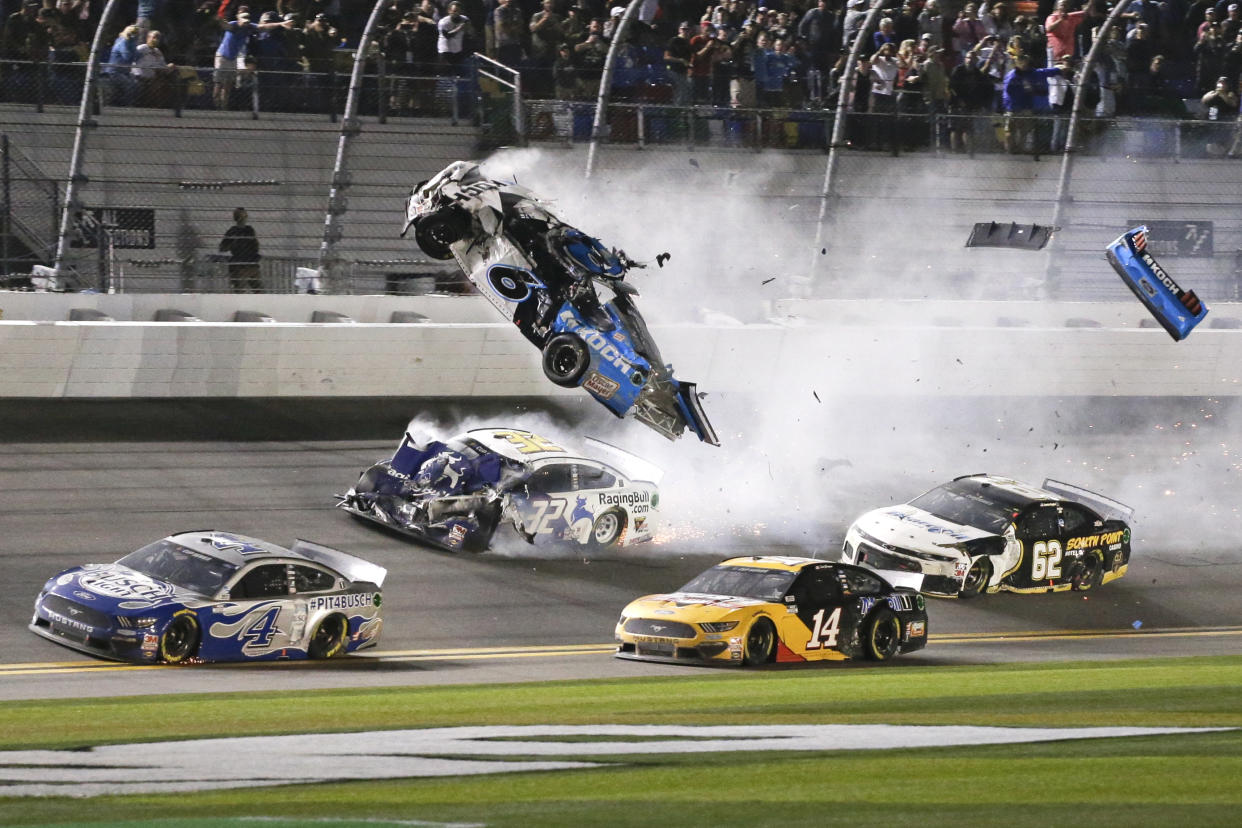 Ryan Newman (6) goes airborne as he collided with Corey LaJoie (32) on the final lap of the Daytona 500 on Monday. Sunday's race was postponed because of rain. (AP Photo/Terry Renna)