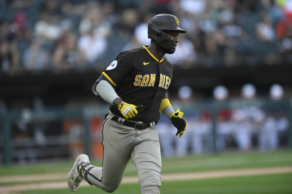 San Diego Padres' Jurickson Profar watches his RBI single during the 11th inning of a baseball game against the Chicago White Sox, Sunday, Oct. 1, 2023, in Chicago. (AP Photo/Paul Beaty)