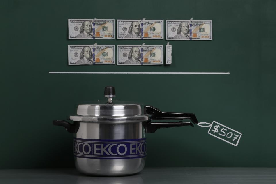 An aluminium pressure cooker as photographed with an illustrative price tag of $753 in Caracas