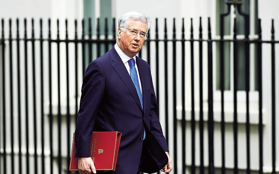 Secretary of State for Defence Sir Michael Fallon arrives at No.10 Downing Street in 2017