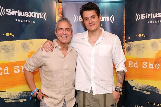 <p>Kevin Mazur/Getty Images</p> From left: Andy Cohen and John Mayer attend as Ed Sheeran performs live for SiriusXM at the Stephen Talkhouse on August 14, 2023 in Amagansett, New York.