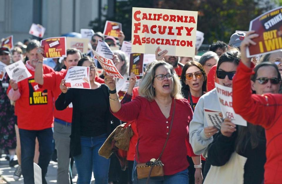 Hundreds marched through the Fresno State campus as the Fresno Chapter of the California Faculty Association held a rally calling attention and support for contract negotiations Tuesday morning, Nov. 7, 2023 in Fresno.