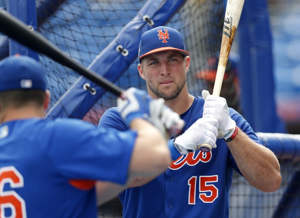 Tim Tebow got his first spring training hit Monday. (AP)