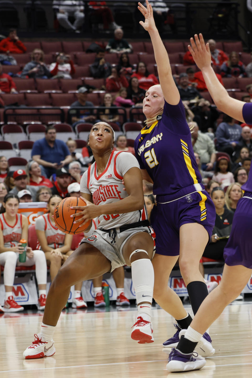 Ohio State's Cotie McMahon, left, looks for an open shot as Albany's Helene Haegerstrand defends during the second half of an NCAA college basketball game on Friday, Dec. 16, 2022, in Columbus, Ohio. (AP Photo/Jay LaPrete)