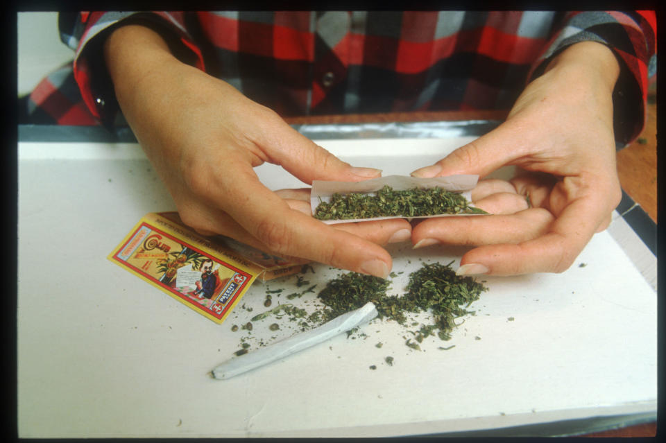 Rolling a marijuana cigarette. (Photo: Jim Pozarik/Getty Images)