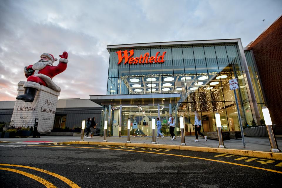 Black Friday at Westfield Garden State Plaza in Paramus on Friday November 27, 2020. Things are quiet in the early morning as a small group enters  the mall near the Big Santa. 