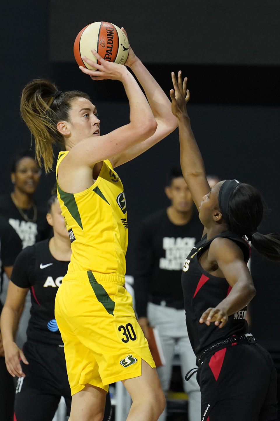 Seattle Storm forward Breanna Stewart (30) shoots over Las Vegas Aces guard Jackie Young (0) during the second half of Game 1 of basketball's WNBA Finals Friday, Oct. 2, 2020, in Bradenton, Fla. (AP Photo/Chris O'Meara)