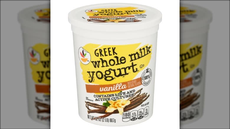 Tub of vanilla Greek yogurt