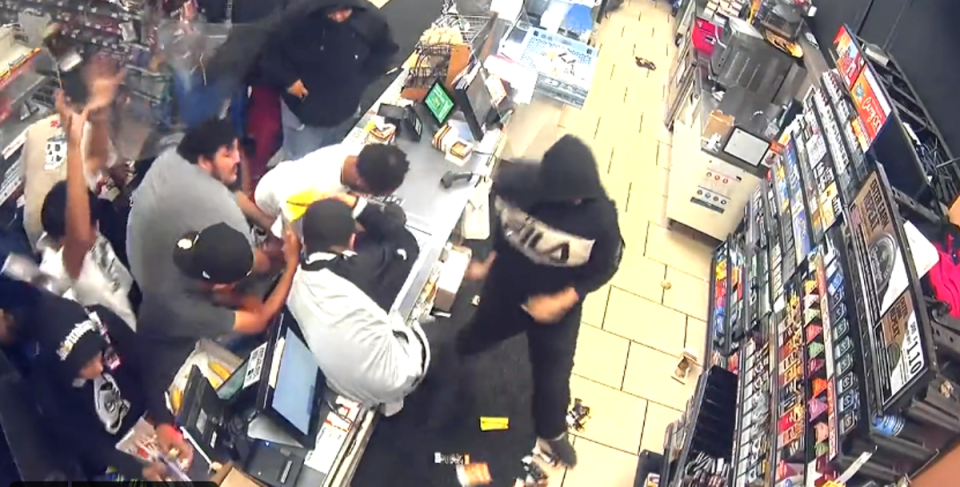People who began looting a 7-11 on Monday morning were seen taking cigarettes, food, drinks and lotto tickets, with one group even attempting to steal the cashier’s box, police said (LAPD)