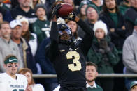 Purdue wide receiver David Bell (3) makes a catch against Michigan State during the second half of an NCAA college football game in West Lafayette, Ind., Saturday, Nov. 6, 2021. Purdue won 40-29. (AP Photo/Michael Conroy)