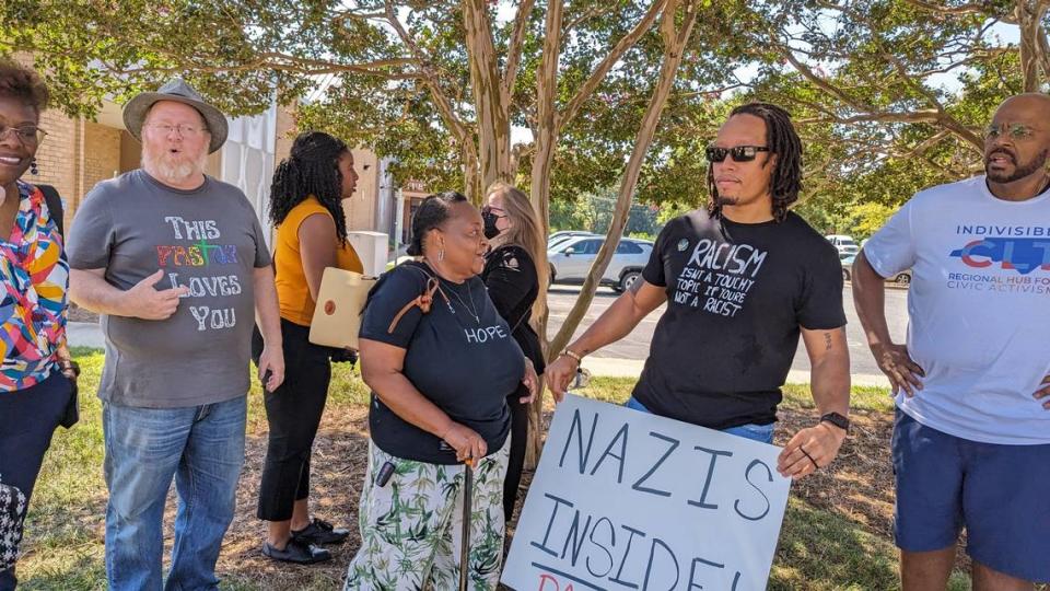 LGBTQ supporters protest at the Union County Library Saturday because of its decision to deny a local pride group use of its meeting rooms on Constitution Day. 