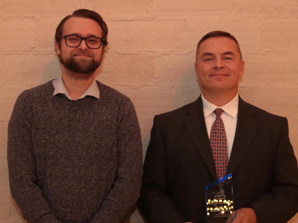 Clinton High School STEM teacher Ron Schaffner, right, is the 2023 Educator Hero. He is pictured with Nate Adams from Comerica Bank.