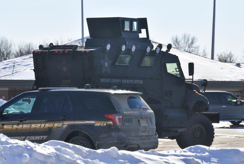 A Wright County Sheriff's Department armored vehicle is stationed near the Super 8 Motel Tuesday, Feb. 9, 2021, in Buffalo. 