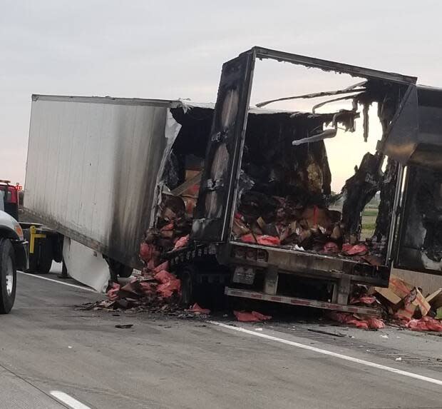 The eastbound lanes of a section of Highway 401 in Chatham-Kent are closed after a fire involving a tractor trailer, police say. (OPP - image credit)