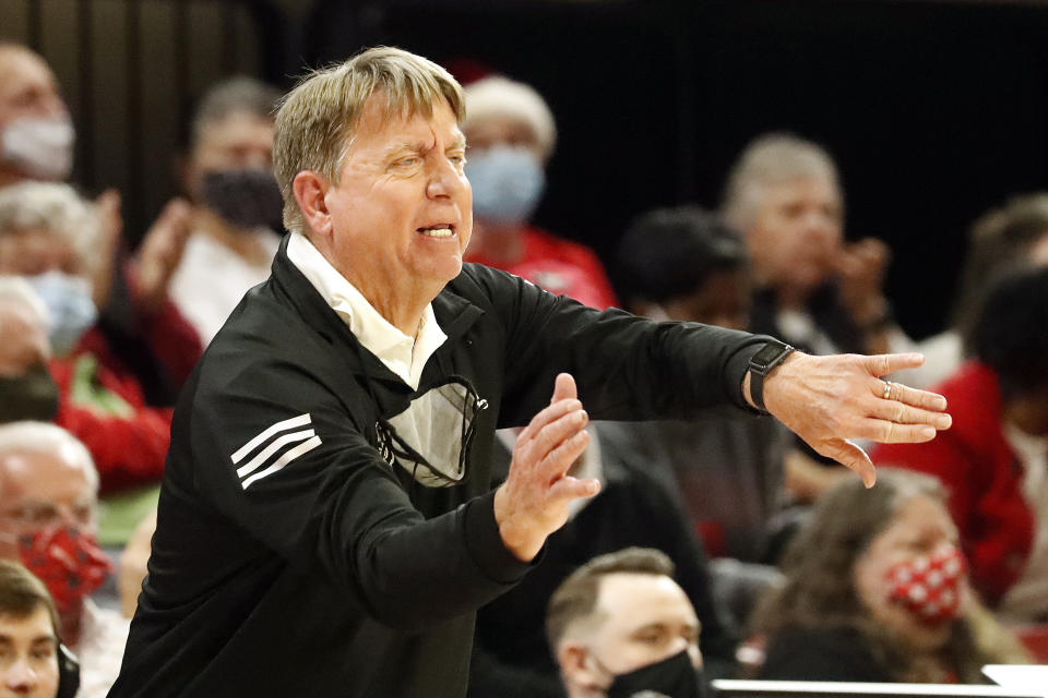 North Carolina State head coach Wes Moore instructs his team from the sideline during the second half of an NCAA college basketball game against Georgia, Thursday, Dec. 16, 2021, in Raleigh, N.C. (AP Photo/Karl B. DeBlaker)