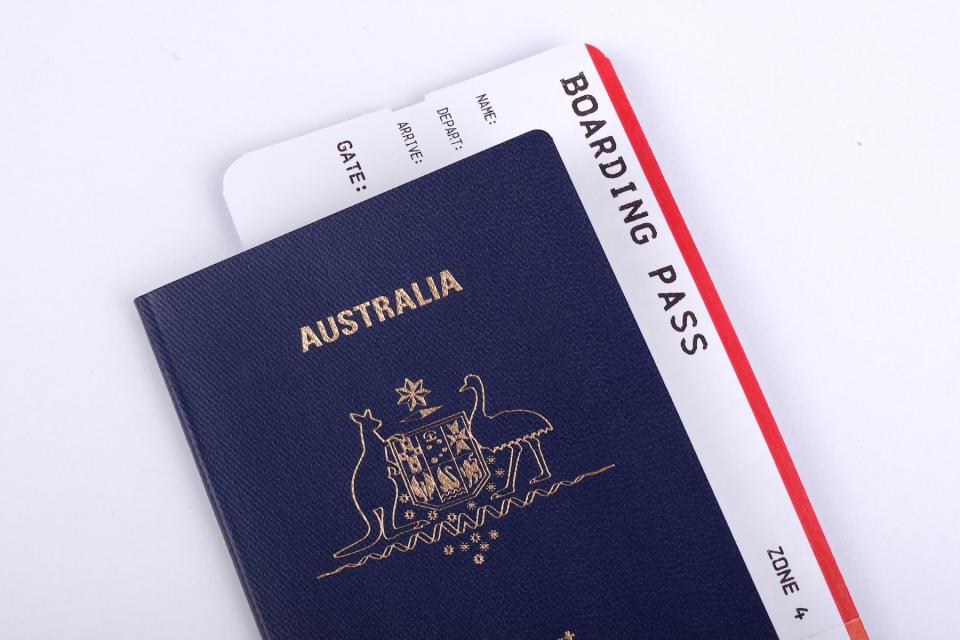 Australian passport with boarding pass