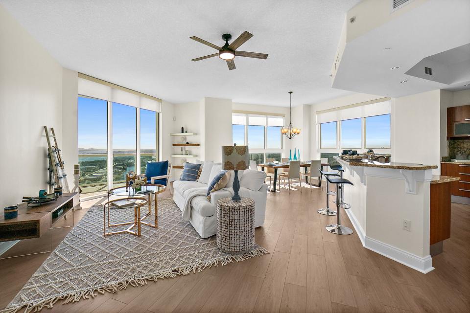 Live like you're at the top of the world with this Marina Grande penthouse, which showcases modern finishes, with 10-foot ceilings, two skylights, Italian cabinetry, new flooring and fresh paint.