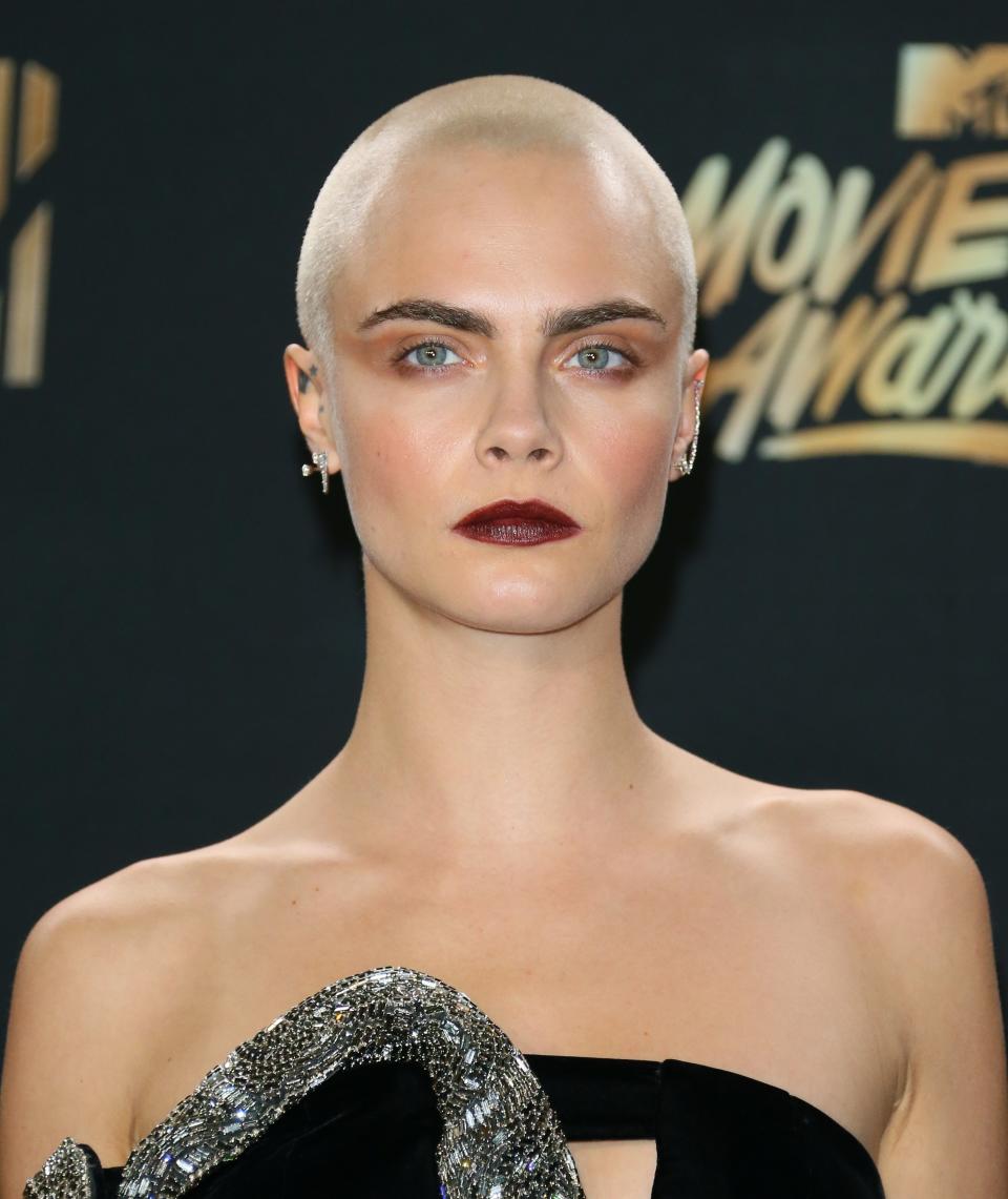 closeup of her bleached buzz cut