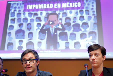 Mexican actor Gael Garcia Bernal (L) attends a side event on "Combatting atrocity, crimes, corruption and impunity in Mexico" next to Isabelle Gattiker Director of the FIFDH during the Human Rights Council at the United Nations in Geneva, Switzerland, March 13, 2018. REUTERS/Denis Balibouse