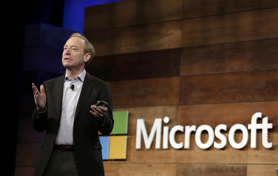 Microsoft president Brad Smith speaks at the annual Microsoft shareholders meeting Wednesday, Nov. 29, 2017, in Bellevue, Wash. (AP Photo/Elaine Thompson)